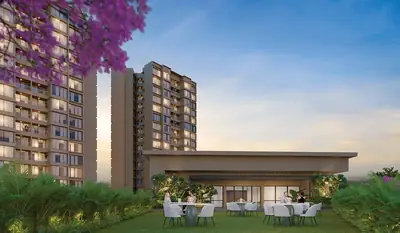 Landscaped garden seating beside the clubhouse, with towers behind