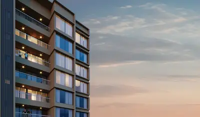 Tower facade with private balconies at sunset